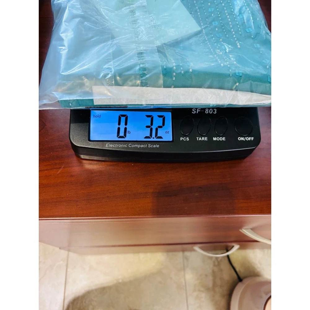 Unbranded sheer teal